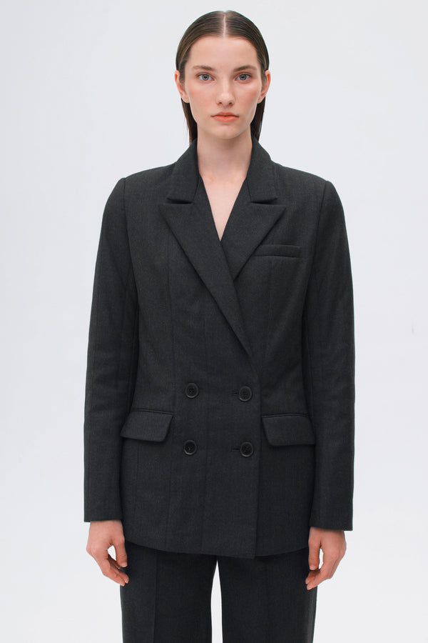 Chic black wool blazer with a tailored waist