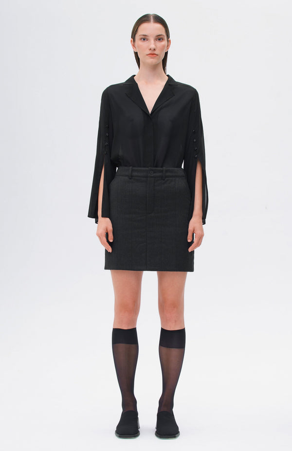 Short length black wool skirt perfect for office capsule wardrobe