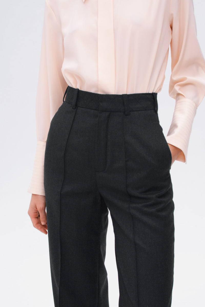 Black wool pant with a flared cut and high waist