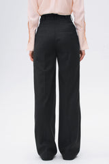 Black wool pant with a flared cut and high waist